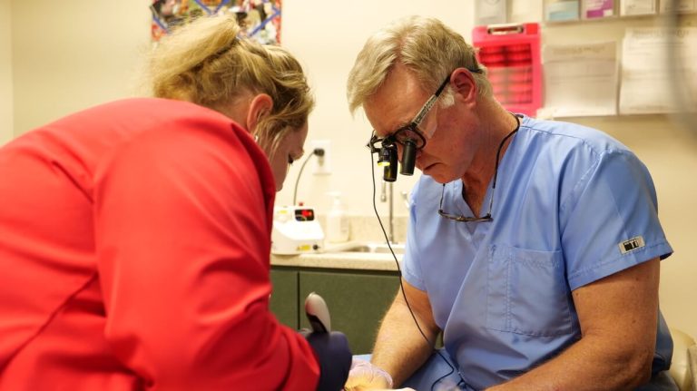 doctors working on patient